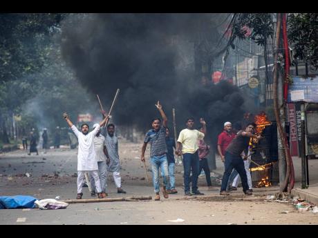 Students clash with police during a protest over the quota system in public service in Dhaka.