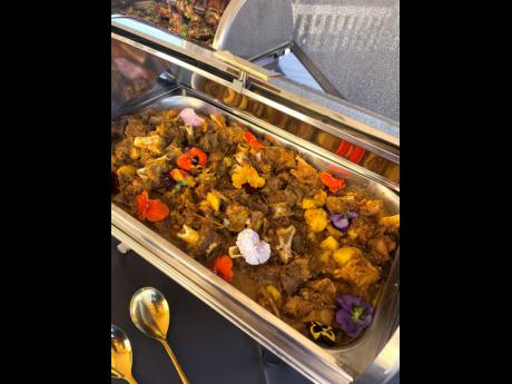 Growing up on curried goat, the caterer added it to her tasty line-up.