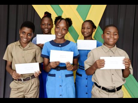 Beneficiaries of the Poverty Alleviation and Empowerment Foundation Scholarship 2024 are (from left) Jahleel Jumpp, Amelia Brown, Britany Thomas, Cymphonique Messam, and Shamar Gordon. The students were presented during a  ceremony held at the Spanish Town