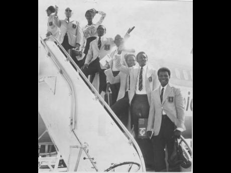 In this 1976 photo the final batch of Jamaica’s team to the 21st Olympics in Montreal, Canada, pose before boarding Air Jamaica’s Flight 071