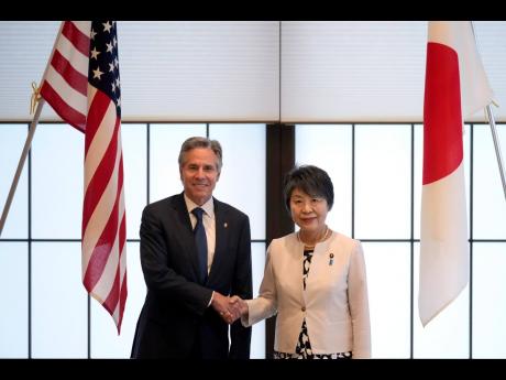 US Secretary of State Antony Blinken, left, and Japanese Foreign Minister Yoko Kamikawa shake hands before their bilateral meeting at the Foreign Ministry’s Iikura guesthouse in Tokyo.