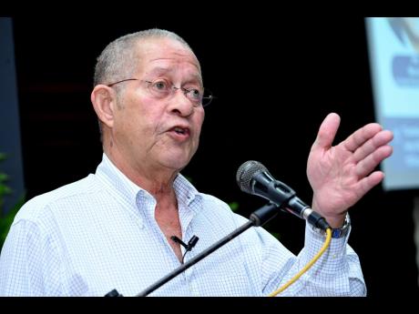 Former Prime Minister Bruce Golding addressing an event hosted by the Faculty of Law at The University of the West Indies, Mona, on Tuesday.