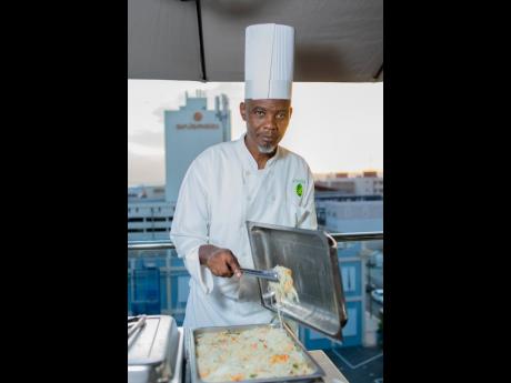 Chef Anthony Bennett serves up delicious meals for the guests.