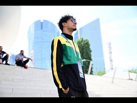 Jamaica’s 100-metre butterfly representative Josh Kirlew stares at the entrance to the Paris La Défense Arena where he will jump off in heat one of the event at the Paris Olympics tomorrow.