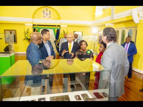 Their Excellencies, Prime Minister Holness and Culture Minister Olivia ‘Babsy’ Grange enjoy the Taino exhibition of the past and present, during the tour at the Independence Reception.