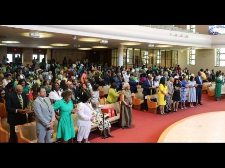 Jamaicans and friends of Jamaica lift their voices in song at the 190th Emancipation and 62nd Independence church service held at the Sligo Seventh-Day Adventist Church in Takoma Park, Maryland, on Sunday, July 28.   