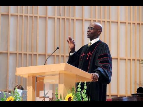 President of the Jamaica Union of Seventh-Day Adventists, Pastor Everett Brown, delivers the sermon at the 190th Emancipation and 62nd Independence church service held at the Sligo Seventh-Day Adventist Church in Takoma Park, Maryland, on Sunday, July 28. 