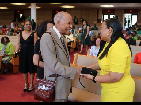 Stanford University Professor Emeritus, Jamaica-born Dr. Donald Harris, father of US Vice President and potential Democratic presidential candidate Kamala Harris, is greeted on arrival by Deputy Chief of Mission at the Jamaican Embassy in Washington, DC, L