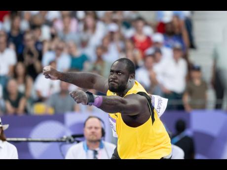 Rajindra Campbell competes in the men’s shot put Group A qualifiers at the Stade de France in Paris, France, yesterday. Campbell advanced to the final with a throw of 21.05 metres.