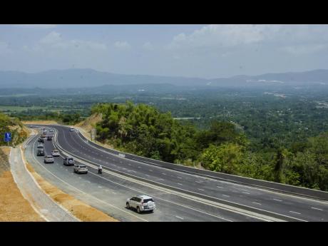 Motorists traverse the Linstead to Moneague leg of the North-South Highway.