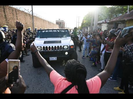 Jubilant fans celebrating the entertainer Vybz Kartel’s release from prison last Wednesday.