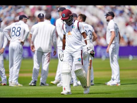 
West Indies’ Kirk McKenzie leaves the field after being dismissed by England’s Mark Wood during day one of the Third Rothesay Test match against the West Indies at Edgbaston, Birmingham, England, on Friday, July 26, 2024. 