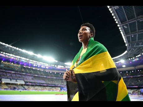 
Shanieka Ricketts celebrates mining the silver medal in the women’s triple jump at the Olympic Games inside the Stade de France in Paris, France, yesterday.