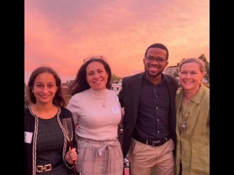 American Scholars Sophie Huttner. Astrid Liden. Jamaican scholar David Salmon with American Rhodes Scholar Martina Vandenberg.