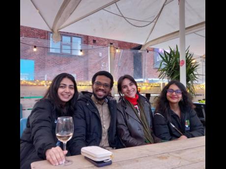 Classmates Sonakshi Grover. Isobel Glover and Ishika Srivastava with David Salmon at a cohort outing.