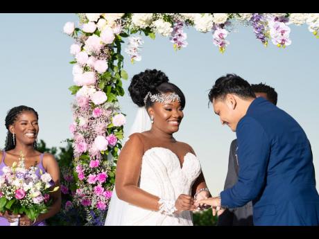 As they say ‘I do,’ the newly-weds seal their love with rings and heartfelt vows at the altar.