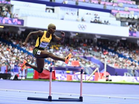 Janieve Russell of Jamaica competing in the women’s 400m hurdles qualifications at the Stade de France in Paris, France, on Sunday. 