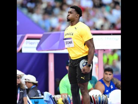 Roje Stona, of Jamaica, competing in the men’s discus throw qualification round group at the Stade de France in Paris, France. 