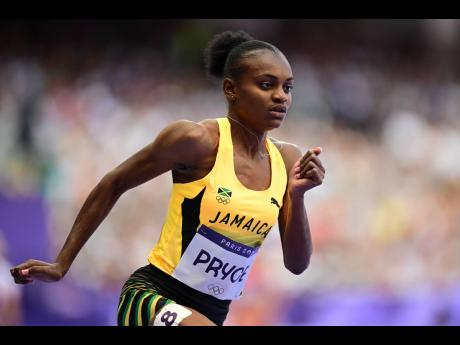 Nickisha Pryce of Jamaica competing in the women’s 400m heats at the Stade de France in Paris yesterday. Pryce advanced to the semifinals after she won her heat in 50.02 seconds. 