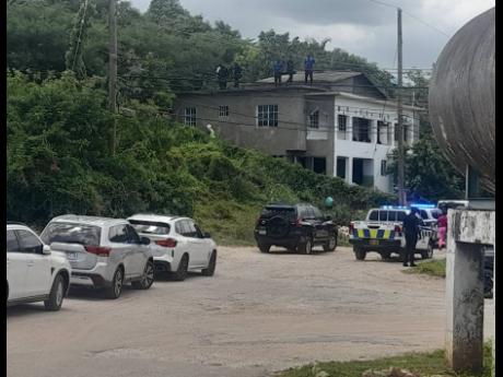 The two-storey house where three men were killed in a shootout with the police on Sunday morning. 