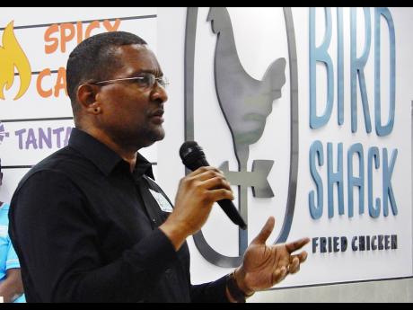 Wayne Cummings speaks at the opening of a BirdShack Fried Chicken restaurant.