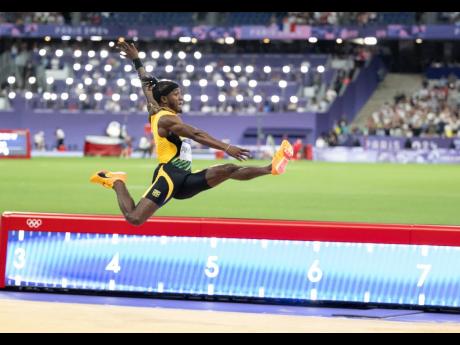 Jamaica’s Wayne Pinnock competing in the men’s long jump final at the Olympics at the Stade de France in Paris on Tuesday.