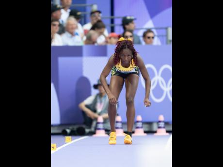 Jamaica’s Chanice Porter gets ready to go down the runway during the qualification round of the women’s long jump at the Stade de France yesterday.