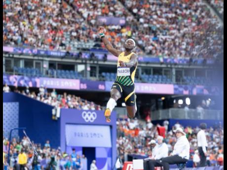 Carey McCleod takes flight during the men’s long jump finalat the Paris Olympic Games inside the Stade de France yesterday.