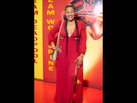 Sandrea Johnson, human resources projects and communications lead, Wisynco Group, is on-theme in this red maxi dress.  