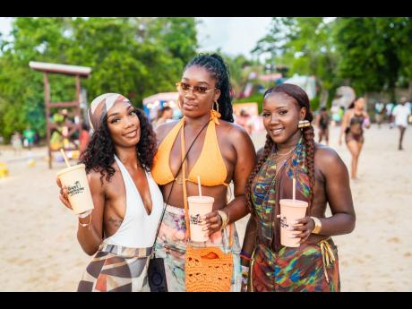 These ladies certainly know how to make an entrance!  From left: IT Manager Sherene Leggie, Events Manager Frankie Campbell, and teacher Kay Williams caught our attention. 