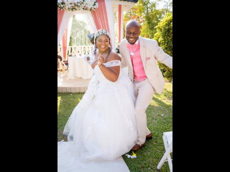 Mr and Mrs Rowe in a celebratory mood after tying the knot.