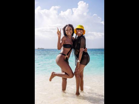 Besties Harri-Anne Brissett (left) and Lamoya Mullings make a cute duo sporting their fashionable black swimwear.   