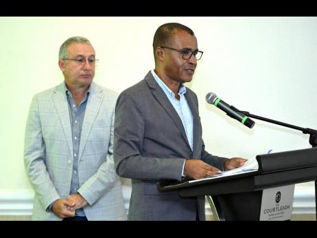 
Chairman Metry Seaga (left) and CEO Albert Bailey report to shareholders at the annual general meeting of Spur Tree Spices Jamaica Limited on August 14, 2024.