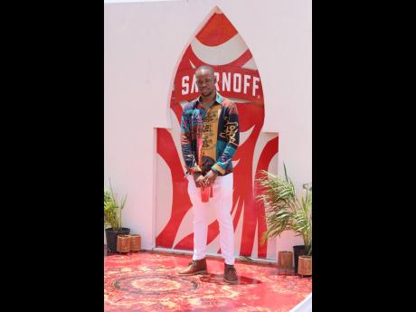 Moroccan vibes activated! Fashion Designer Cavell McDermott opted for an African print long-sleeved shirt with crisp whites and Clarks’ Desert Boots for Diageo Junior Brand Manager Lasana Wilson for a stylish Daybreak look.