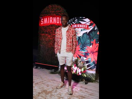 Lasana Wilson rocked a cool look at the Allure event, with a textured cotton and linen embossed jacket over a classic white tee, crisp shorts, and Reebok sneakers.