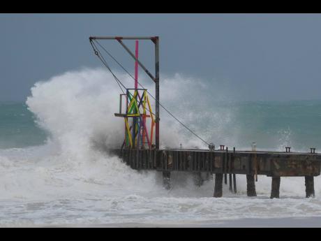 
Waves batter a pier as Hurricane Beryl passes through Bridgetown, Barbados, Monday, July 1, 2024.