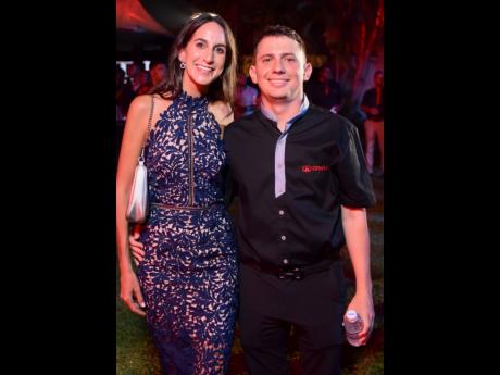 James Lechler (right), business development manager, Caribbean Automotive Network, and his partner, Lauren Mahfood, marketing manager, Trade Winds Citrus.  