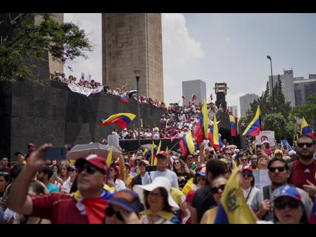 Venezuelan nationals protest in Mexico City against the official results that declared President Nicolás Maduro the winner of the July presidential election.