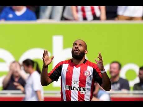 Brentford’s Bryan Mbeumo celebrates scoring during the English Premier League match between Crystal Palace and Brentford at the Gtech Community Stadium, Brentford, England, yesterday.