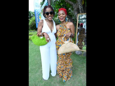 Shelly-Ann Weeks (left) and Stacia Davidson share the frame with their crochet with raffia handle bags, stealing the show.