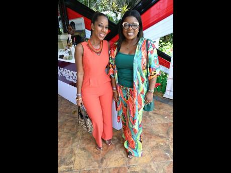 Attorney-at-Law Janna Patel (left) catches up with Georgia Morrison, assistant vice-president of sales, Cuna Caribbean Insurance.