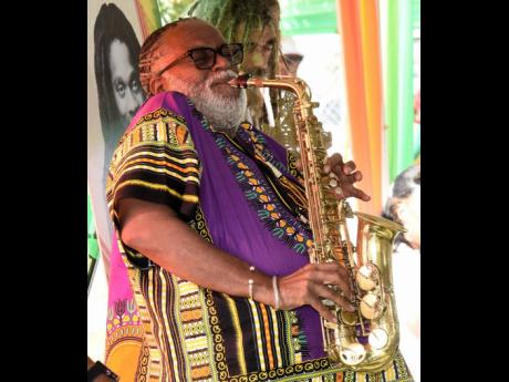 Saxophone master, Dean Fraser, thrills the audience with his skill during Dennis Brown 66th birthday celebrations and wreath laying at the National Heroes Park in Kingston in February 2023. 