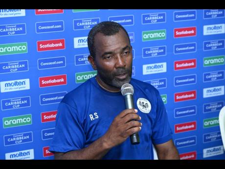 Rudolph Speid, head coach of Cavalier,  speaks to the media during a press conference at Sabina Park yesterday.