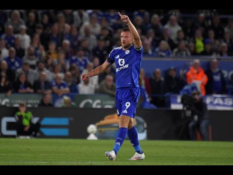 Leicester’s Jamie Vardy celebrates after scoring during the English Premier League  match between Leicester and Tottenham Hotspur at King Power Stadium in Leicester, England yesterday.