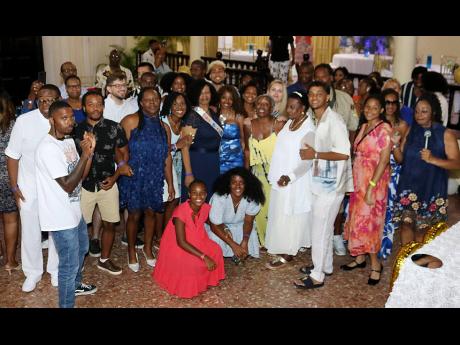 Salome Ogilvie (centre) is joined by family member who journeyed all the way from the USA and Canada alongside relatives in Jamaica to celebrate her 80th birthday at special party at Sea Garden beach resort in Montego Bay, St James, on August 10.