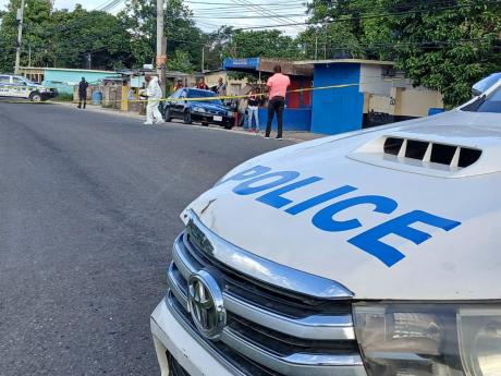 The scene of a deadly shooting in Gregory Park, St Catherine, on Sunday, that left two men dead and another injured.