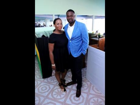 Supreme Ventures Services Limited Acting Chief Executive Officer Krista-Gaye Fisher (left), alongside Supreme Ventures Racing and Entertainment Limited Vice-President of Operations, Christopher Wills.