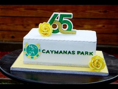 The Caymanas 65th anniversary celebration cake on display at the park.