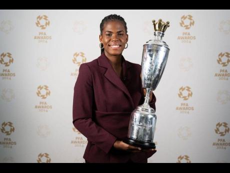 Khadija Shaw shows off the Professional Footballers’ Association Women’s Player of the Year award she won yesterday.Khadija Shaw shows off the Professional Football Association Women’s Player of the Year award she won yesterday.