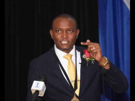 Dr Mark Smith, the newy installed president of the Jamaica Teachers’ Association, making his inaugural address at the organisation’s 60th Annual Conference in Trelawny on Monday.